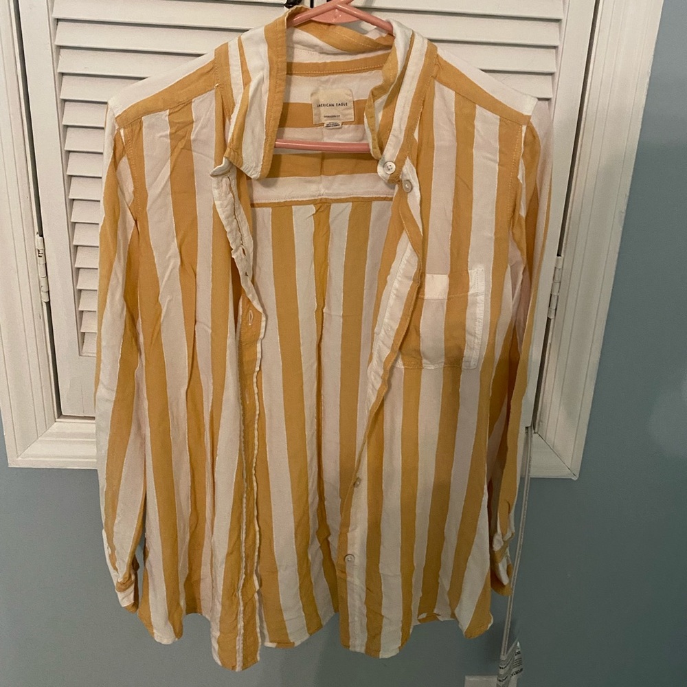Button down white/yellow stripes shirt.